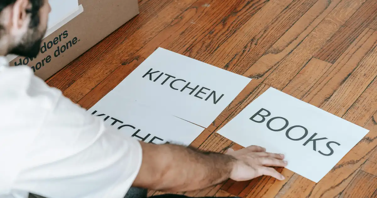 labelling moving boxes, preparing for moving